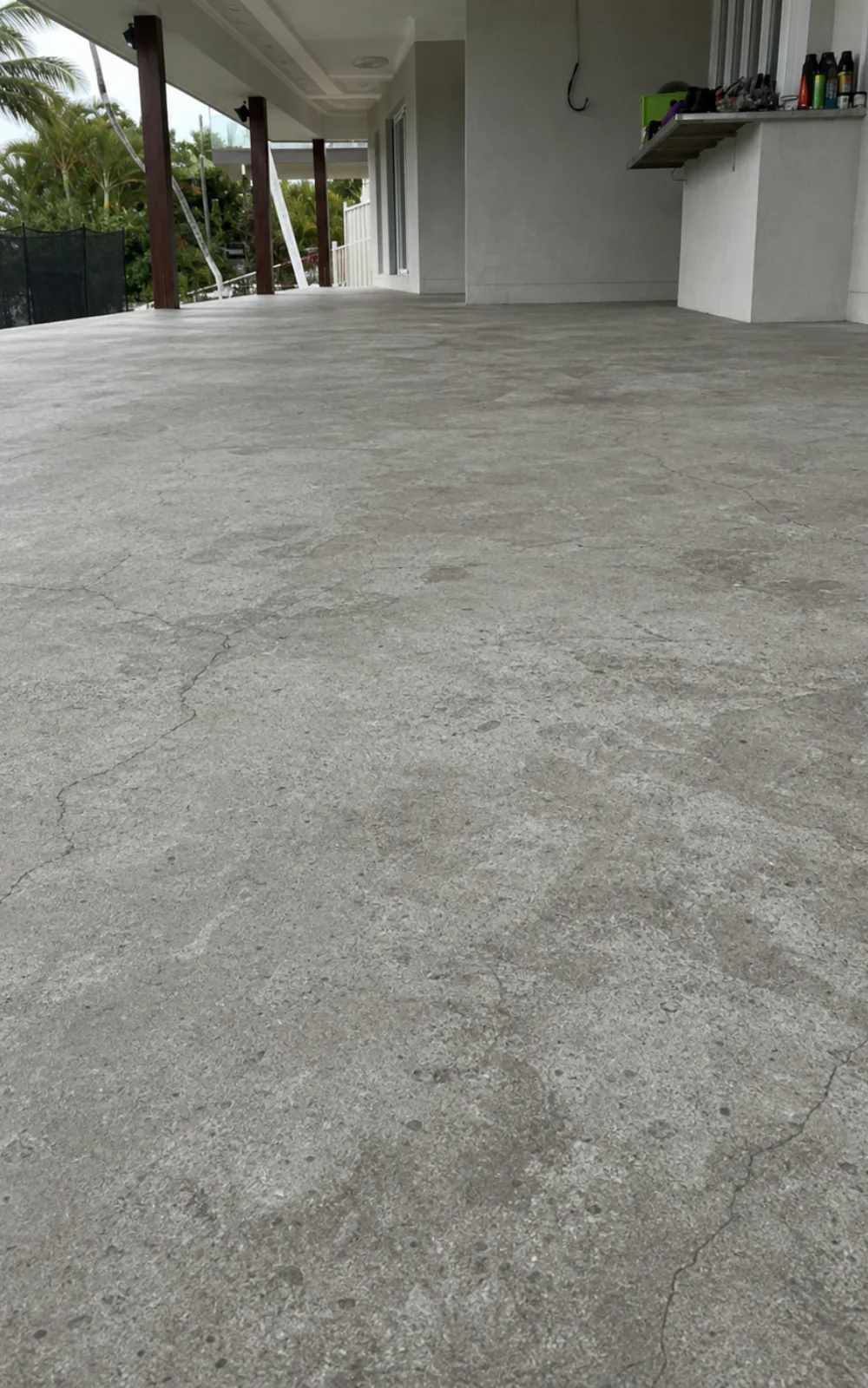 Cracked concrete patio in Adelaide before resin-bound resurfacing