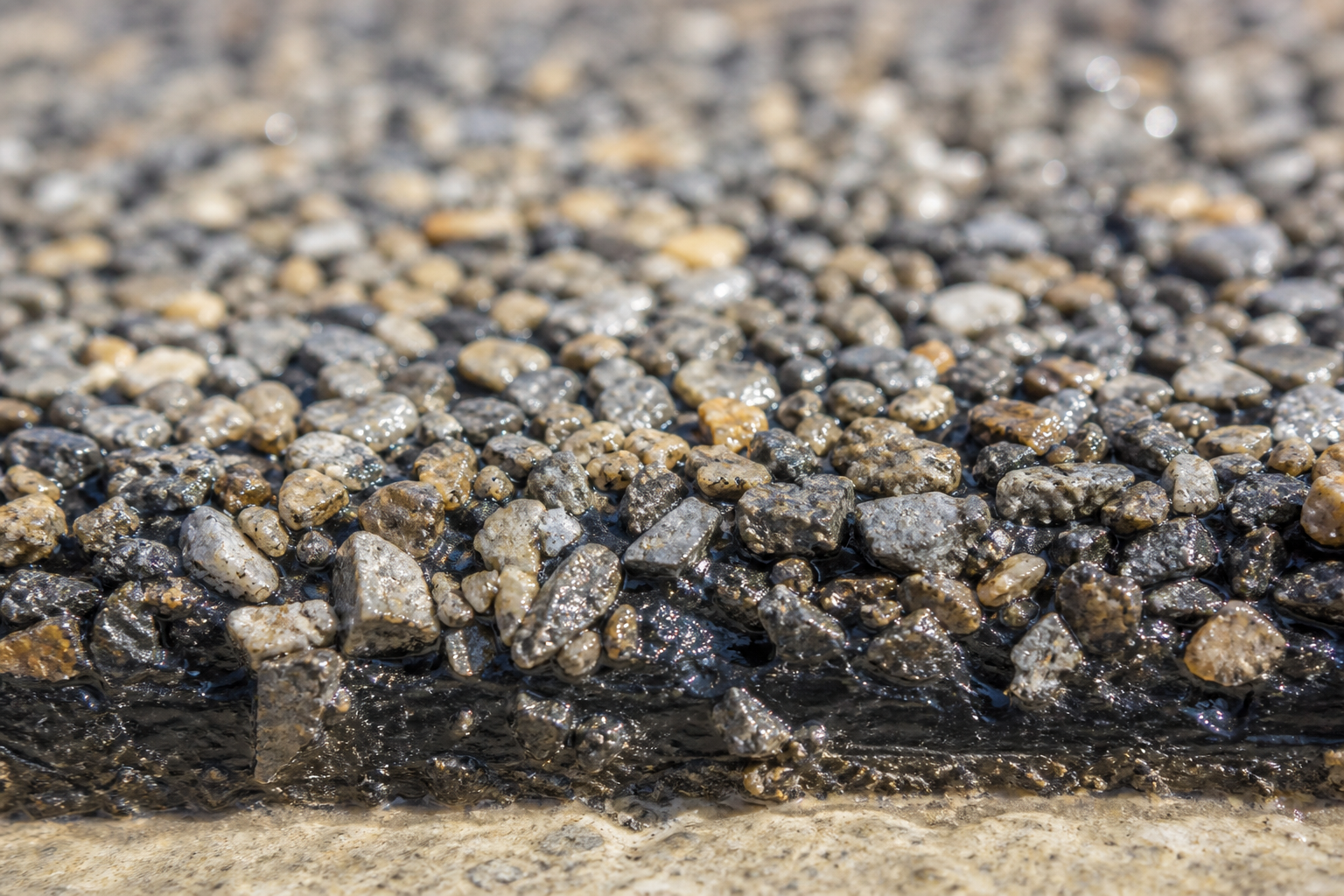 Resin driveway finish used as comparison context for resin systems