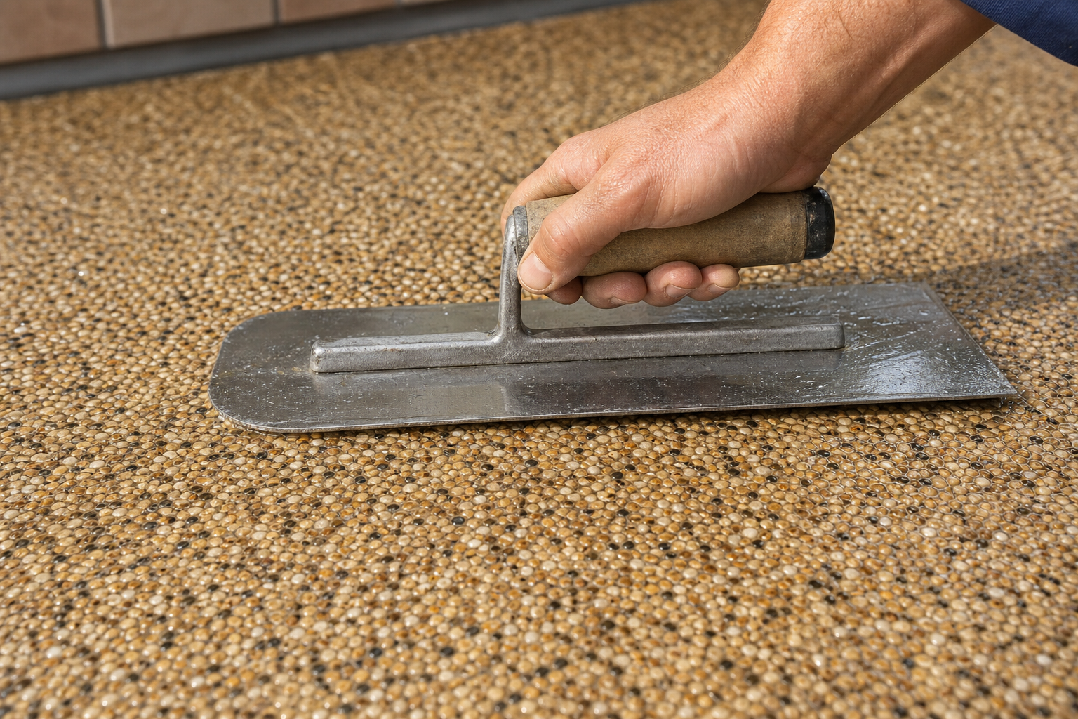 Resin-bound pathway and edging detail during project completion